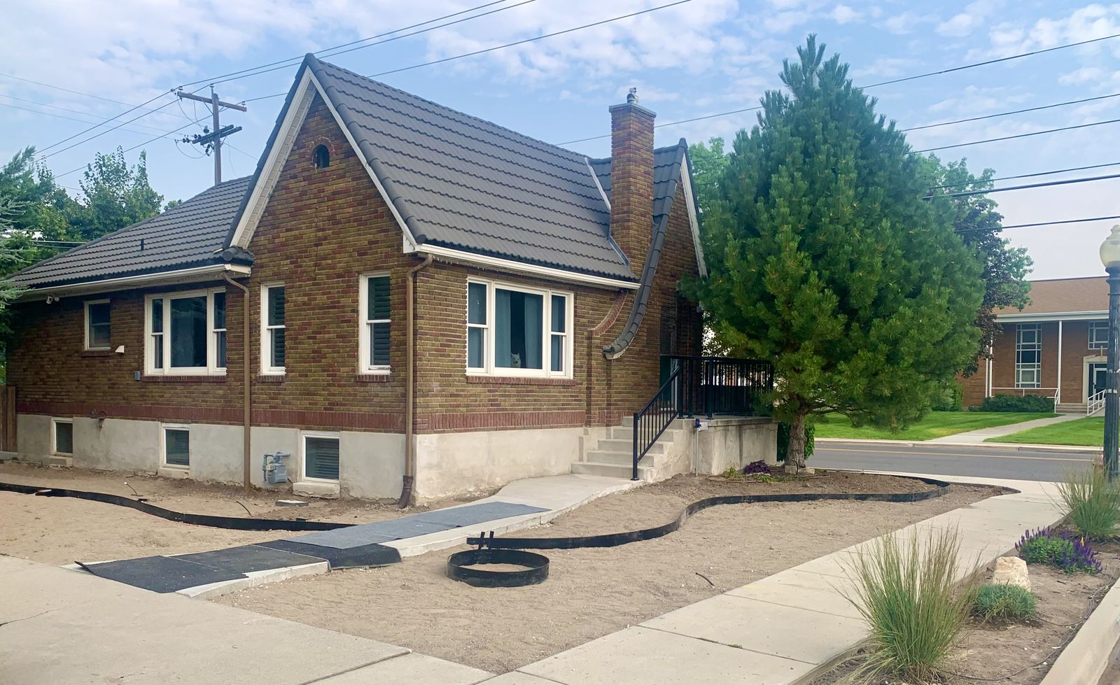 New planting beds and fire pit installed, ready for planting